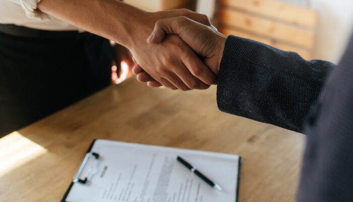 Partnership.,Two,Business,People,Shaking,Hand,After,Business,Signing,Contract